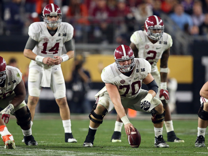 Center Ryan Kelly was a consensus first team All-American in his senior year snapping the ball for Alabama.