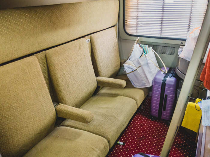 The compartment was — in the parlance of New York City real estate agents — “cozy.” With our two carry-on suitcases and backpacks stowed near the door, moving around turned into a game of Tetris.