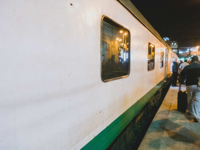 The sleeper train, distinguished by a green stripe, arrived late. By then, the station had emptied out and only German and Chinese tour groups were vying to get on.