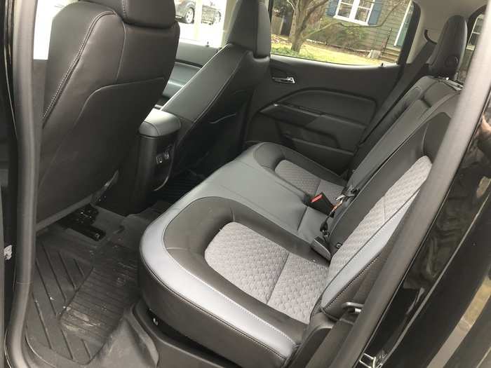 The rear seats in the "Crew" configuration are a simple bench design. Adults can squeeze in, but we