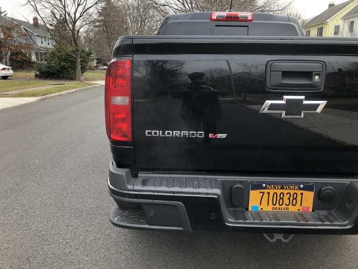 The blacked-out bowtie badge is replicated on the liftgate.