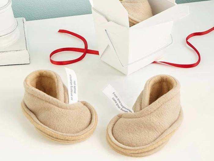 Tiny booties that look like fortune cookies