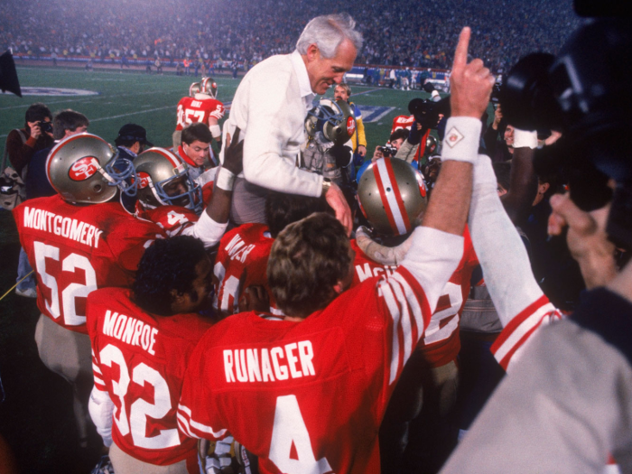 The San Francisco 49ers defeated the Cincinnati Bengals 26-21 and celebrated by carrying head coach Bill Walsh off the field.