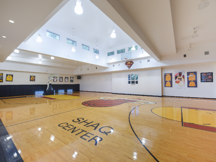 As you might expect from one of the most famous NBA players of all time, the house has its very own 6,000-square-foot indoor basketball court with the words "Shaq Center" printed on the floor.