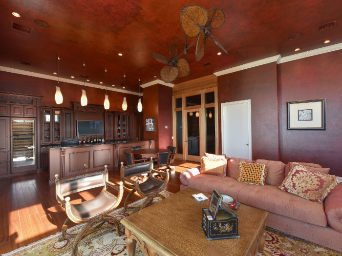 The house includes its own cigar bar and lounge ...