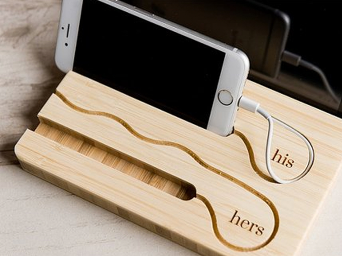 A charging dock that keeps all of their electronics organized