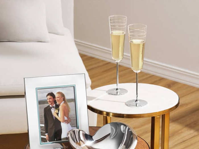 A dainty set of champagne flutes for the married couple