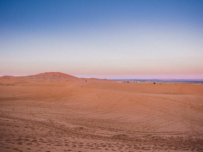 If you look to the horizon line, you can see the Moroccan border with Algeria, marked by the mountain range lit up in the distance in purple.