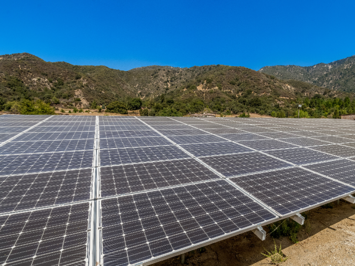 The house has its own water source as well as a solar power system.