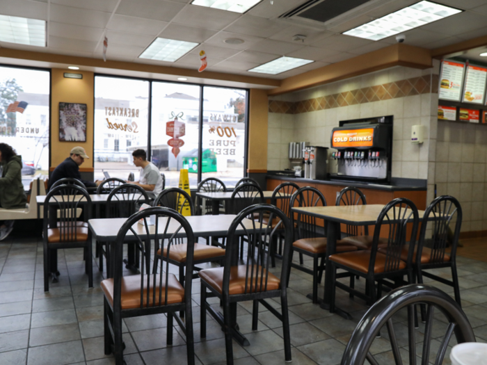 Before we were even done filling our cup with root beer, an employee delivered our food to us and took our orange Whataburger order number.