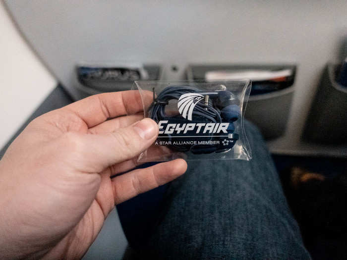 Flight attendants came around to offer up free earbuds for the plane. It