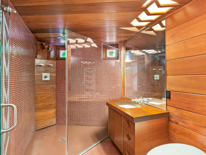 The bathrooms are minimal yet luxurious.