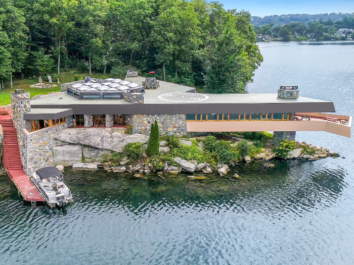 ... and the other is a four-bedroom residence that juts out over Lake Mahopac.