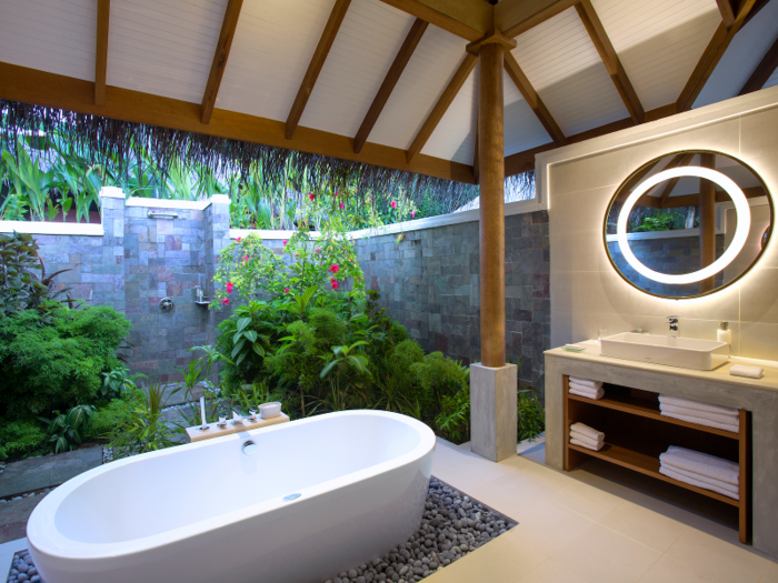 ... and luxurious open-air bathrooms. Rates for Deluxe Villas start at $370 per night for two people in the low season, and $870 in the high season.