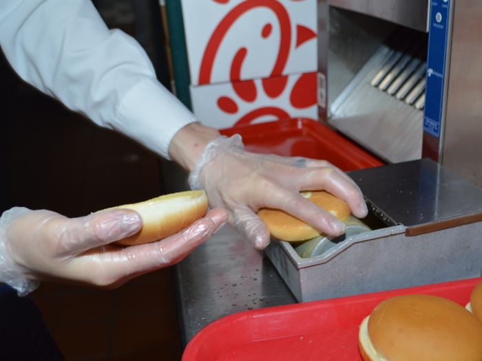 One swipe of each side of the bun across the roller leaves you with a perfectly buttered bun — unless it