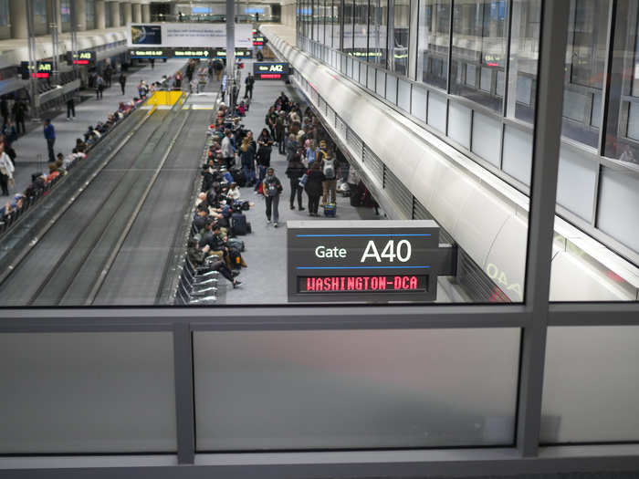 The assigned gate, A40, for the next leg was serving passengers for other flights.