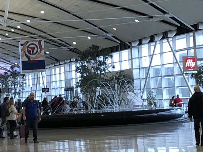 At the mid-point of the A concourse is this fountain, which features dancing streams and spouts of water.