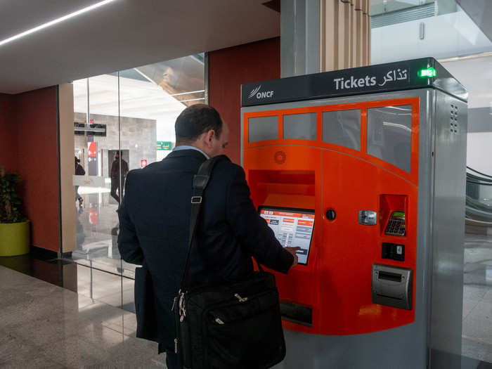 The machines are easy enough to use. Anyone who has visited a major city and used the metro system can figure it out. It accepts cash and credit cards.