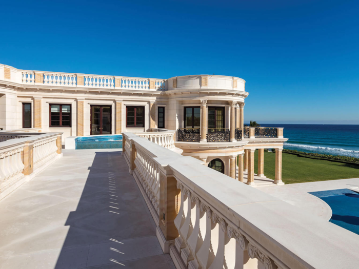 An elevated sky bridge connects the master suite ...