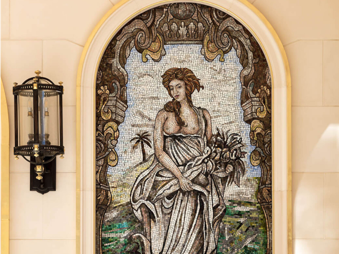 Mosaics stand to the side of the doors and depict the four seasons of the year.