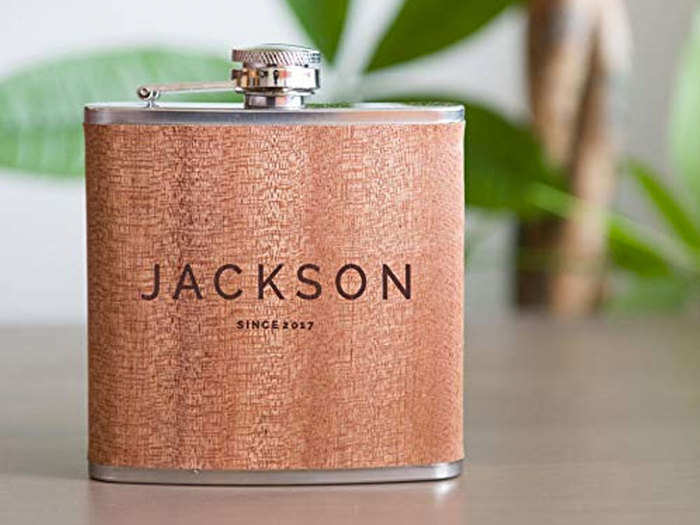 A personalized flask for taking their favorite libations on the go