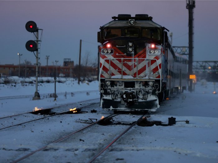 Workers for Chicago’s commuter rail system went to extreme measures to keep the trains running, lighting fires next to frozen tracks.