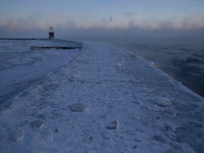 Over Lake Michigan, a fog has formed. Sometimes called sea smoke or sea fog, this can happen when extremely cold air blows over water that