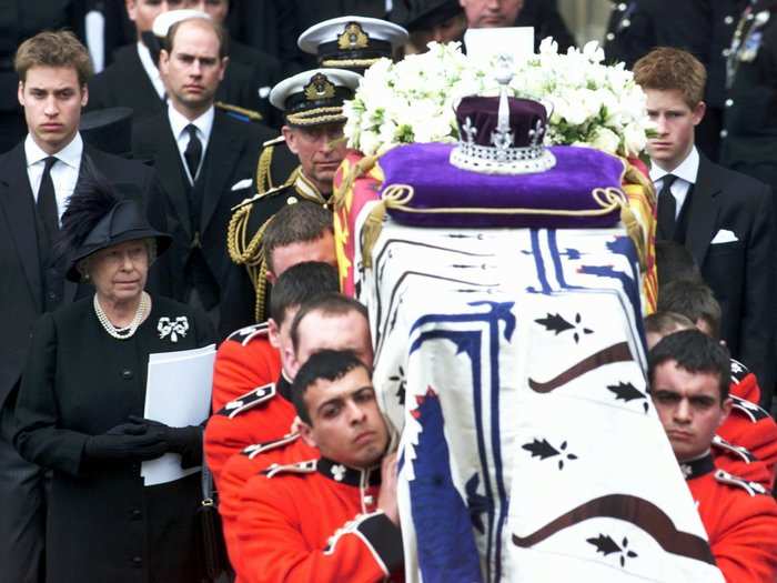 2002: 2002 was a difficult year for The queen. Both her sister, Princess Margaret, and her mother passed away within a month of each other. The picture below shows the Queen and other members of the family during the funeral of the Queen Mother.