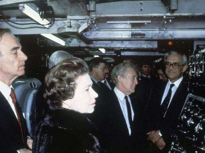 1985: Proprietor of the Times of London Rupert Murdoch and Queen Elizabeth II look over printing operations as editions of Friday, March 1 issues of the Times newspaper go to press. The Queen