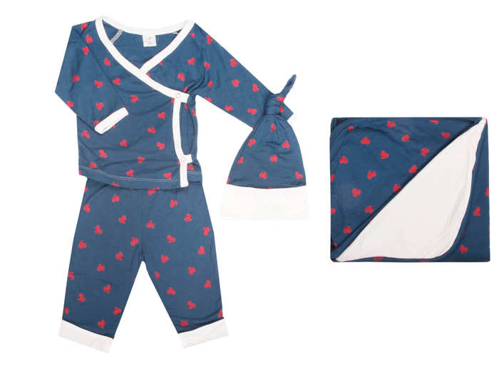 A heart-covered pajama and blanket set