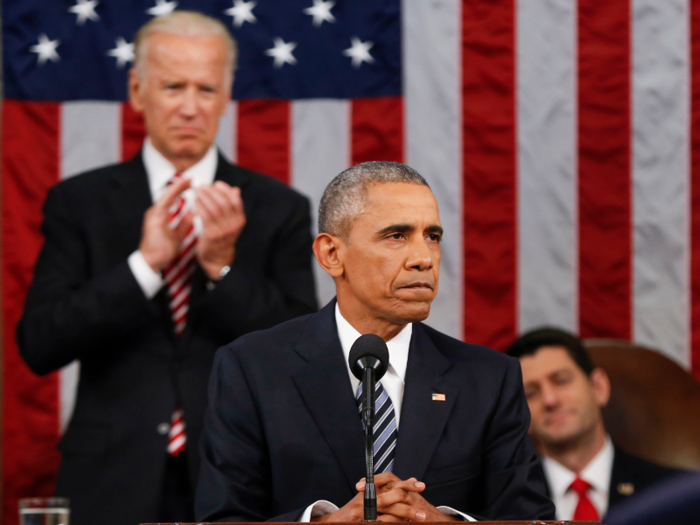 The two who sit behind the president.