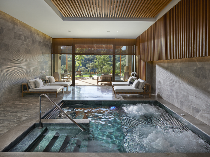 ... and the massive spa includes indoor and outdoor pools, hammams with private scrub rooms, saunas and steam rooms ...