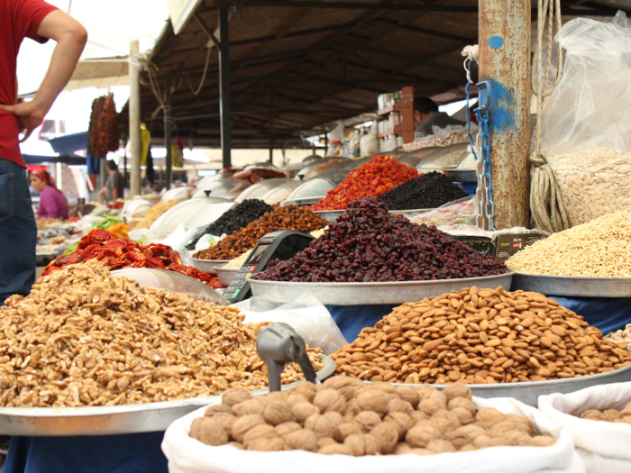 ... and its markets, where vendors sell fresh and dried fruits, herbs, vegetables, local cheeses, olives, olive oil, and more.