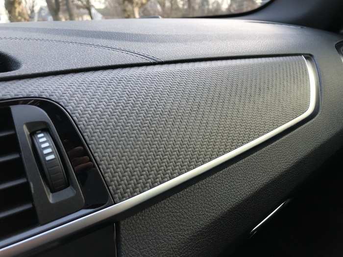 The carbon-fiber trim is quite tasteful, as are the brushed-metal highlights.