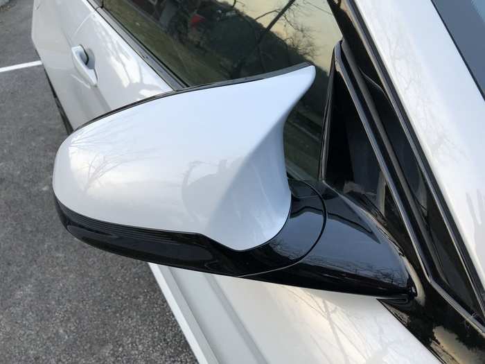 Air can flow around the side-view mirrors (side-views actually create a lot of aerodynamic drag).