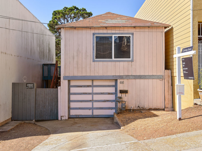 The pink dwelling at 66 Bishop St., though not ravaged by a fire, is far from being in tip-top condition — and yet, it just sold for $600,000.