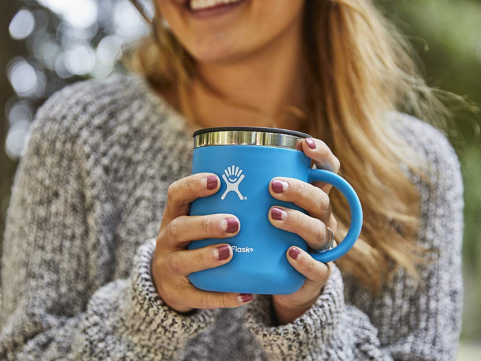 A stainless steel travel mug