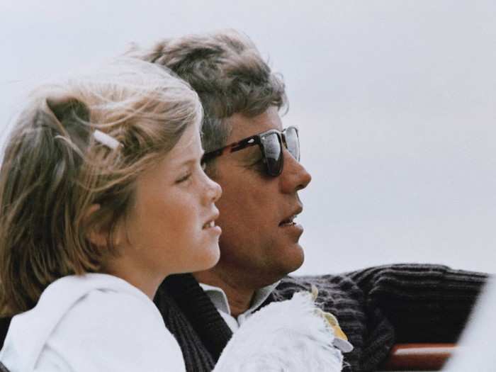 Throughout his time in Washington, Kennedy was able to escape the pressure of the office by traveling to Hyannisport with his family, like here with daughter Caroline in 1962.