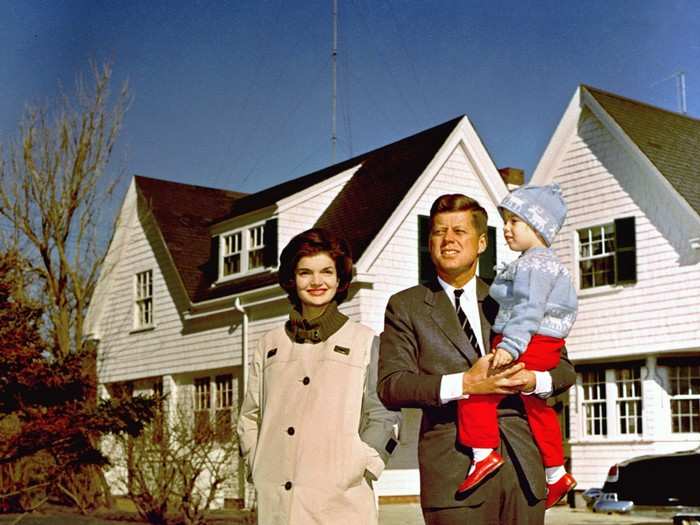 The family spent time at the compound in all seasons, and are pictured here at Hyannisport in November 1960.