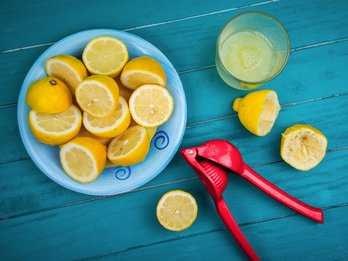 A handheld citrus juicer