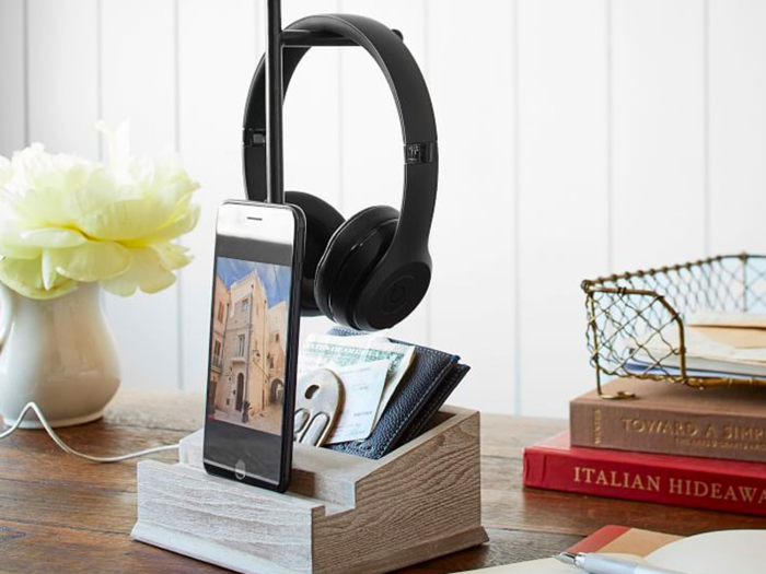 A phone stand that also holds your headphones