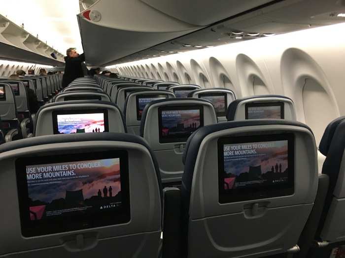 Each passenger has access to a personal entertainment screen.