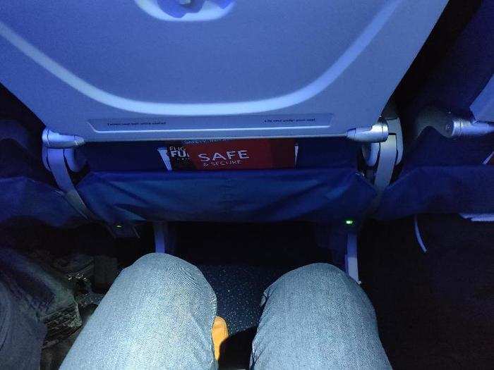 I settled into for the hour-long flight. Legroom proved to adequate, but far from roomy.