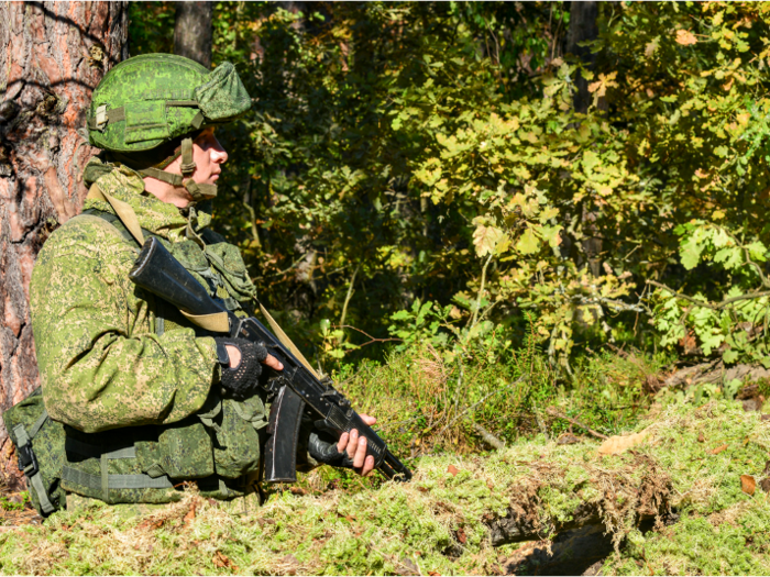 Russian soldiers wear a digital pattern with small pixels that