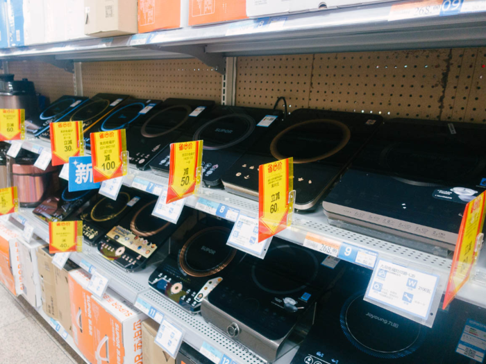 Shelves are stocked with a wide range of items in an effort to cater to local shoppers. In Beijing, it