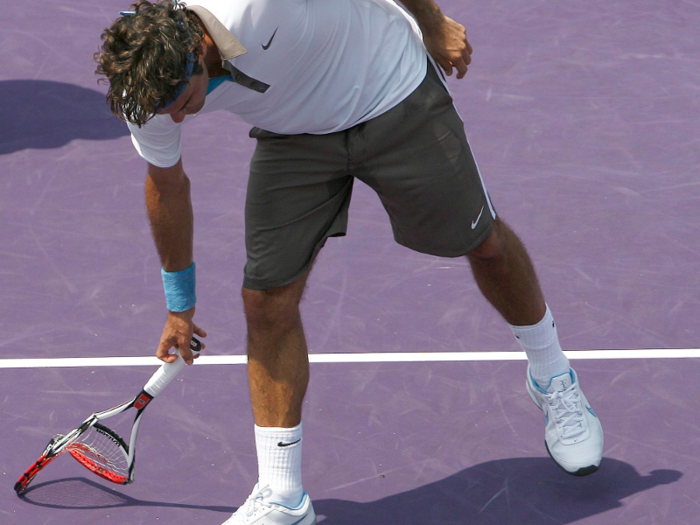 2009: In a semi-final loss to 20-year-old Novak Djokovic at the Miami Masters in April, Federer channeled his younger years as a tennis "brat" and smashed his racket.