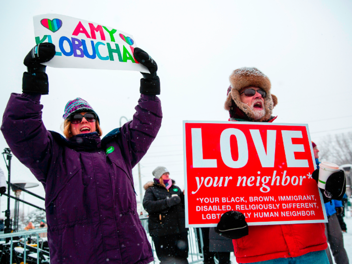 They turned out with signs and plenty of warm clothing.