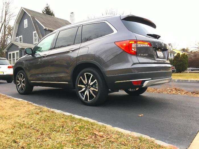 The rear of the Pilot gets new taillights, bumper, and chrome accents.