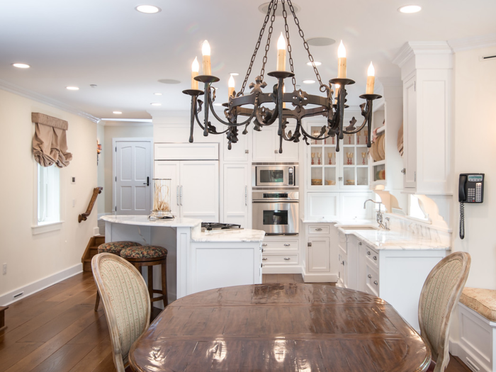With a breakfast nook, an island, and a big kitchen table, this kitchen looks like a gathering spot in Jeter