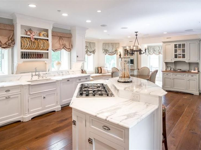 This kitchen — located in the main house — is one of the five kitchens located throughout the two-parcel property.